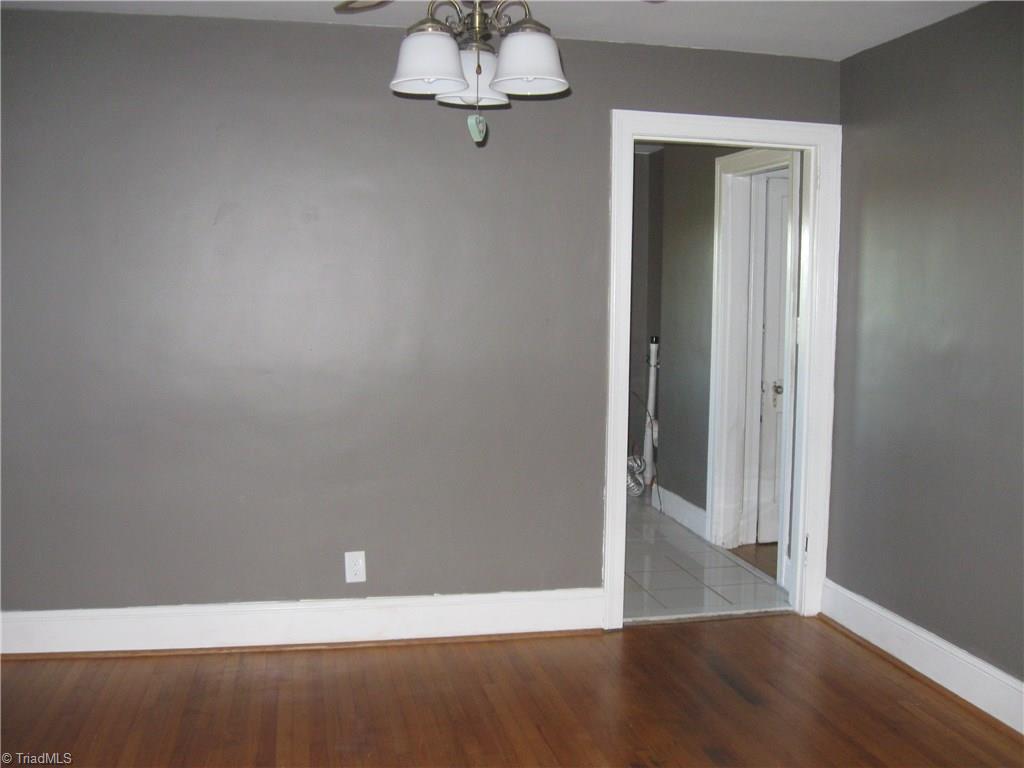 9180 Highway 700 Ruffin, NC 27326 - Photo 4 of 16 Dining Room; lovely ceiling fan; hardwood flooring.