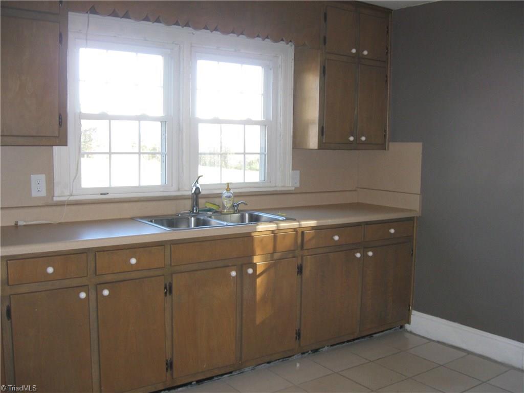 9180 Highway 700 Ruffin, NC 27326 - Photo 6 of 16 Kitchen; new ceramic tile flooring.