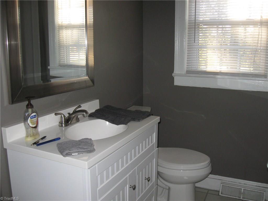 9180 Highway 700 Ruffin, NC 27326 - Photo 8 of 16 Remodeled bathroom; ceramic flooring.