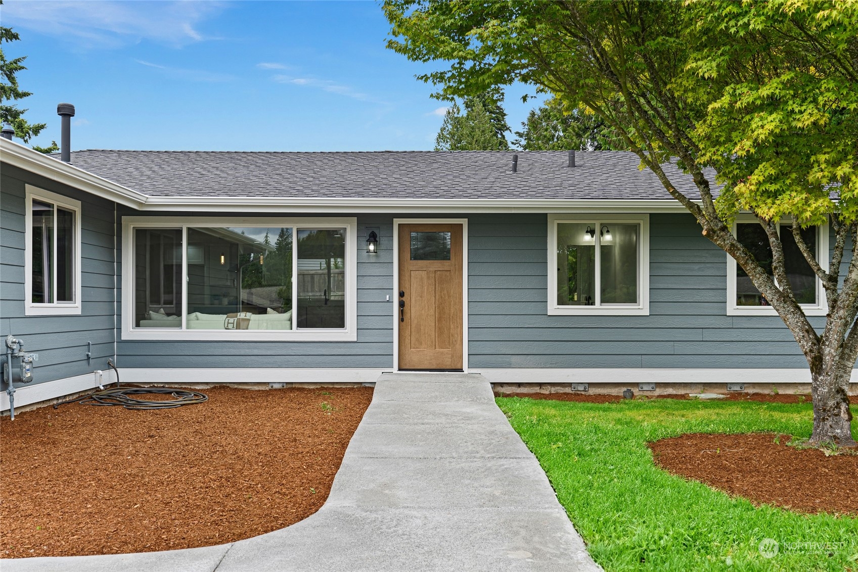311 217th Place Southwest Bothell, WA 98021 - Photo 2 of 28 a view of outdoor space yard and front view of a house