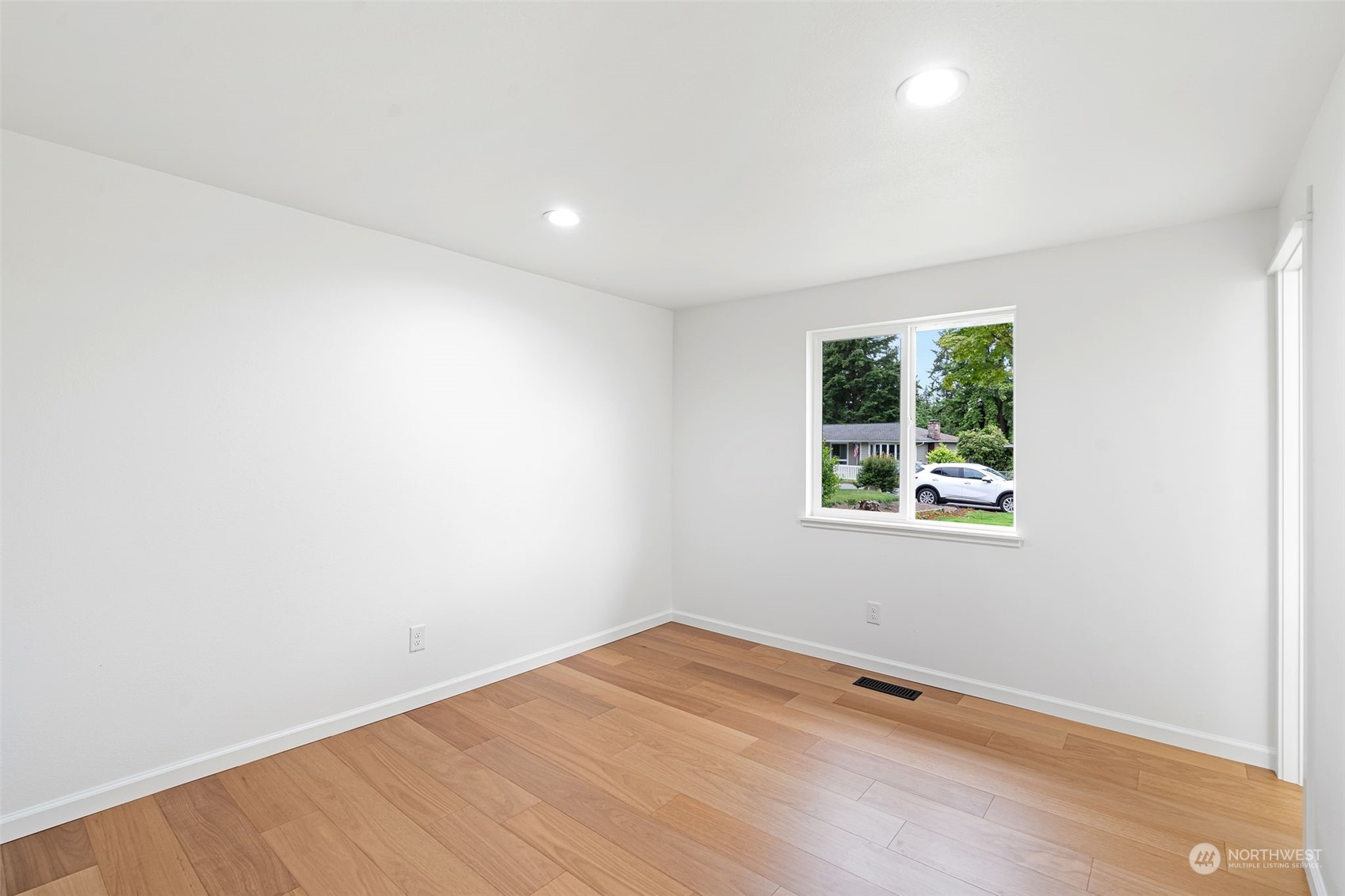 311 217th Place Southwest Bothell, WA 98021 - Photo 21 of 28 an empty room with a window