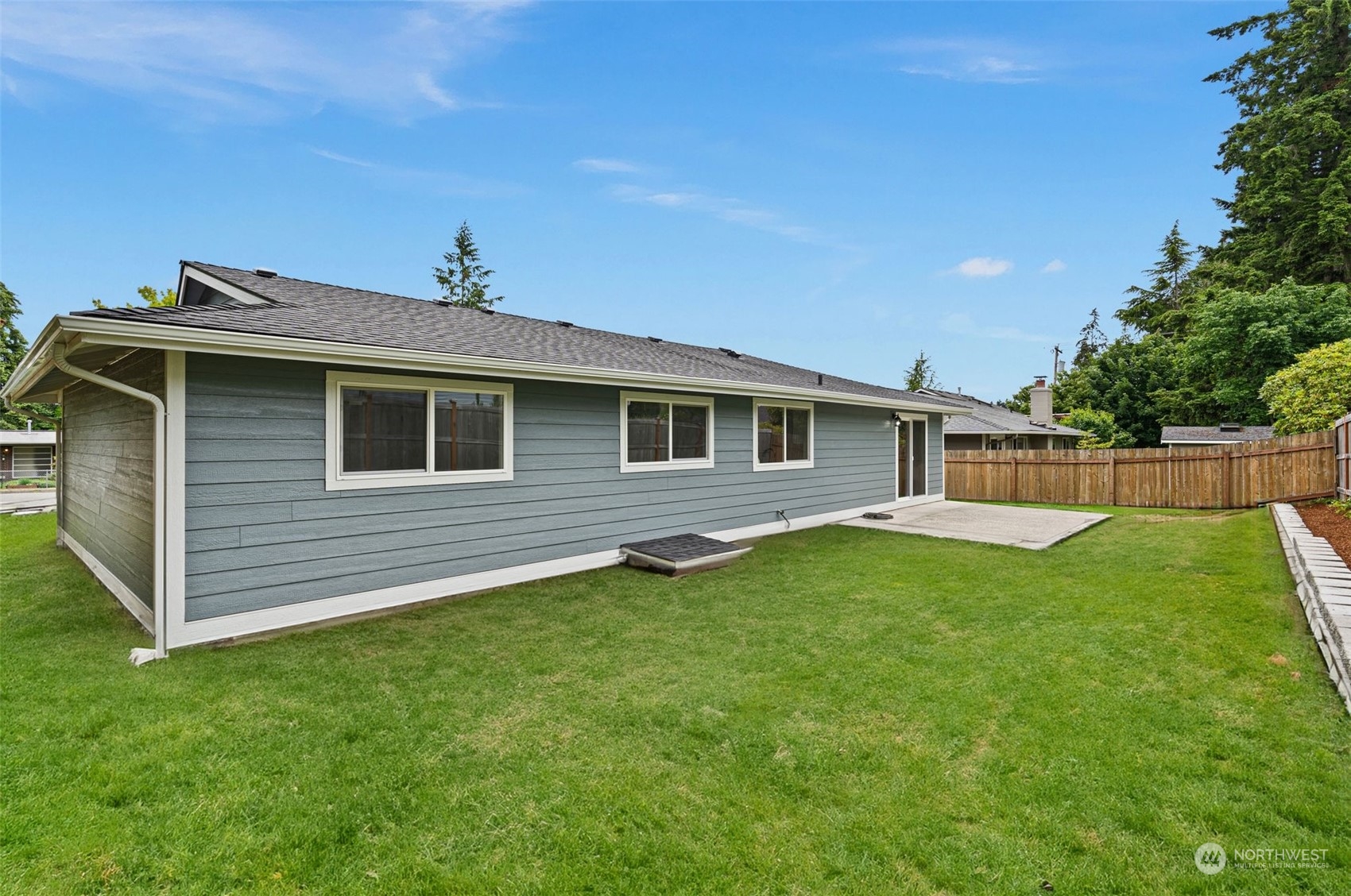 311 217th Place Southwest Bothell, WA 98021 - Photo 26 of 28 a backyard of a house with lots of green space