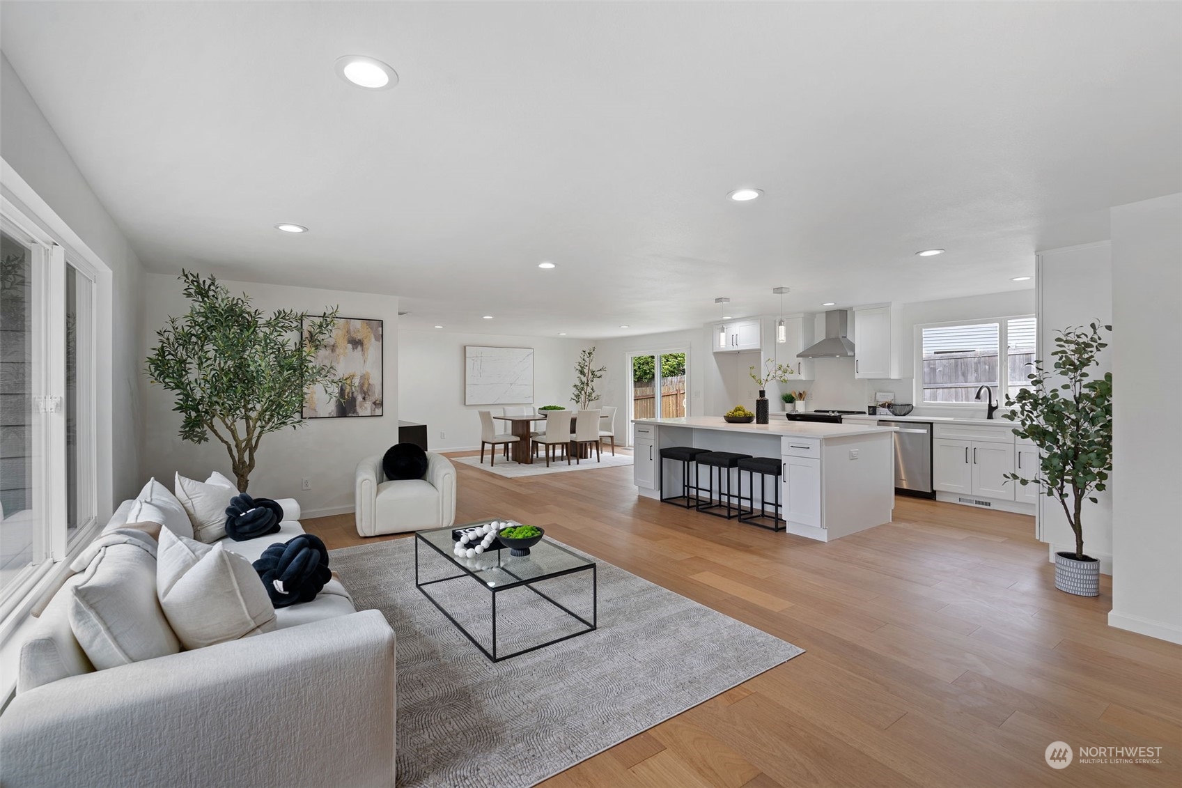 311 217th Place Southwest Bothell, WA 98021 - Photo 5 of 28 a living room with furniture and kitchen view with potted plants