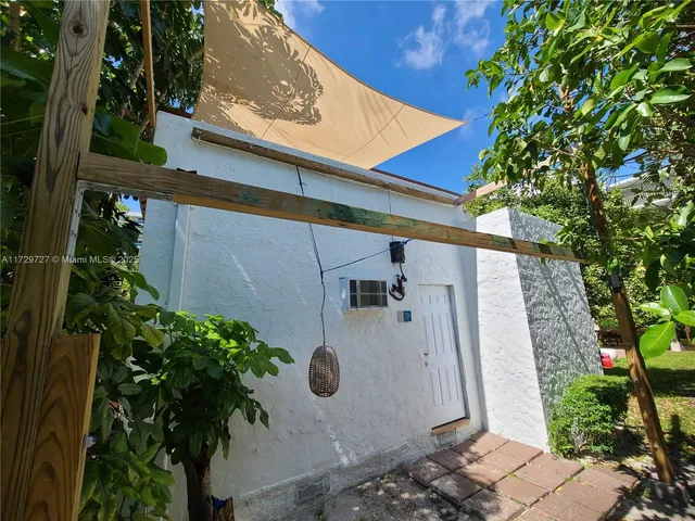 a house view with a garden space