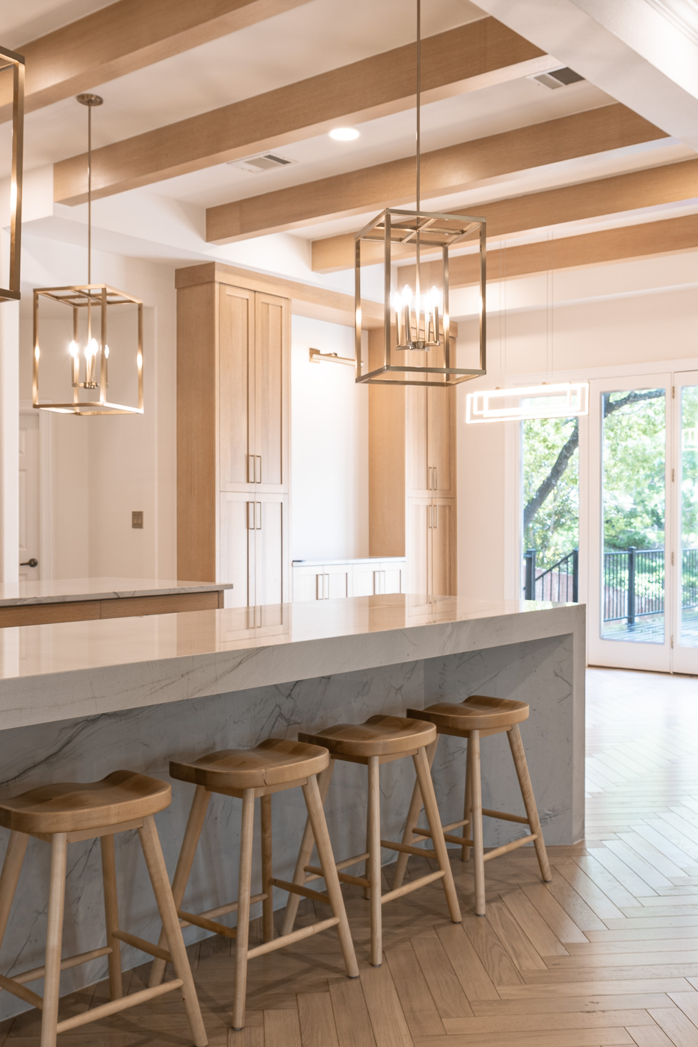2906 Mill Reef Cove Austin, TX 78746 - Photo 11 of 38 a kitchen with a table and windows