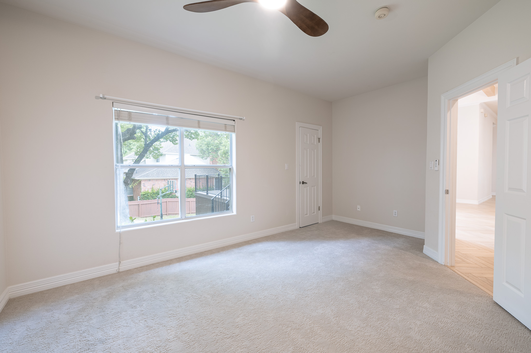 2906 Mill Reef Cove Austin, TX 78746 - Photo 30 of 38 an empty room with a empty space and windows