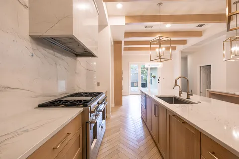 a view of a kitchen with furniture and a kitchen