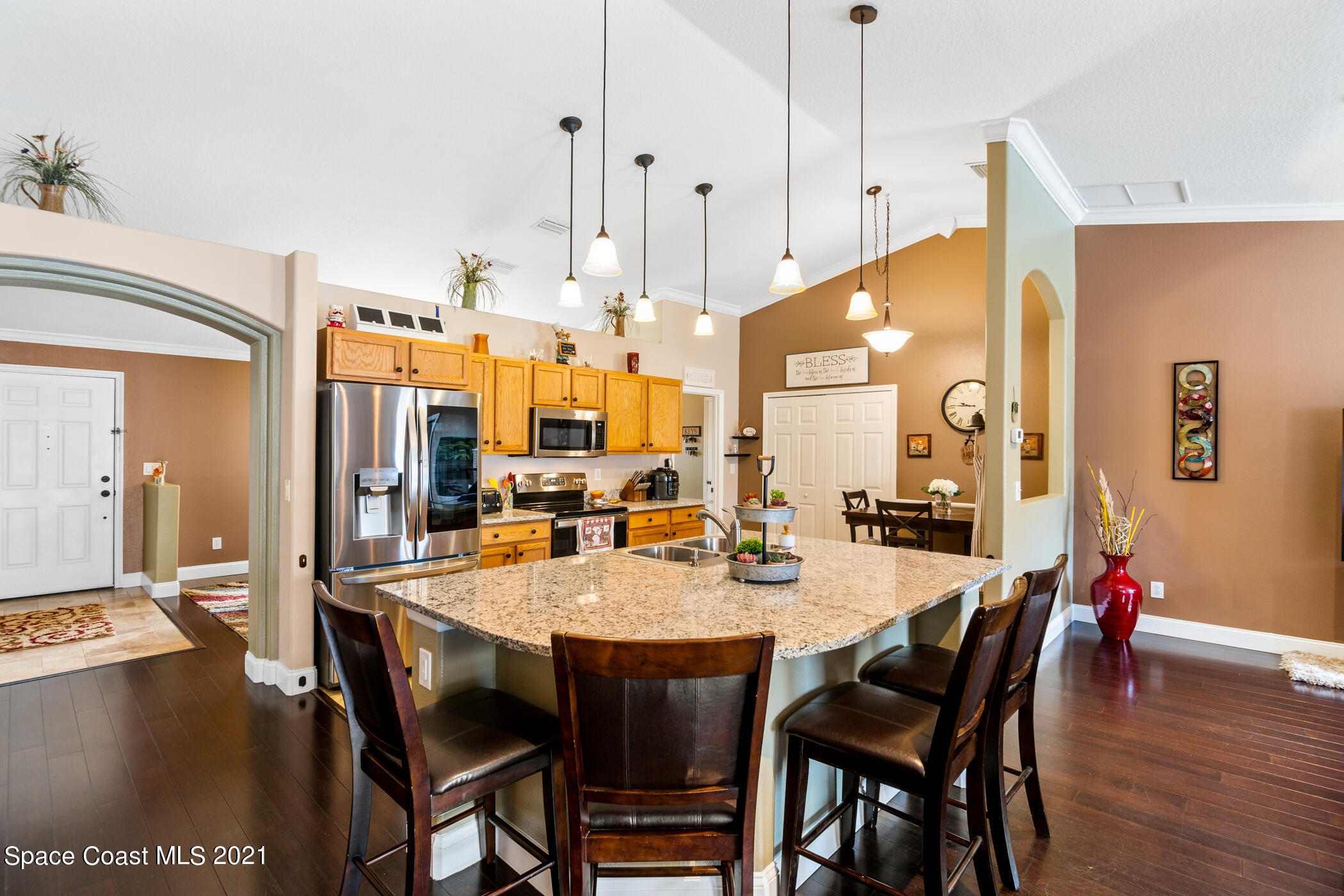 6336 Hudson Road Cocoa, FL 32927 - Photo 4 of 24 a dining room with furniture and wooden floor