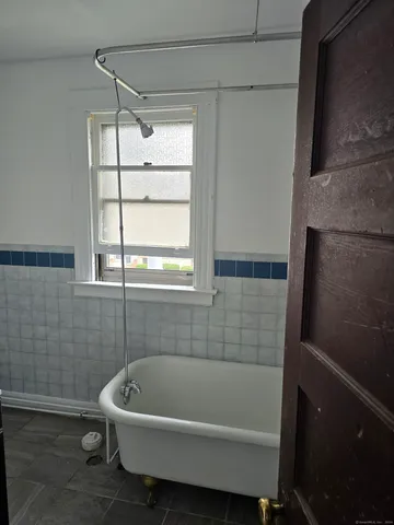 a bathroom with a bathtub