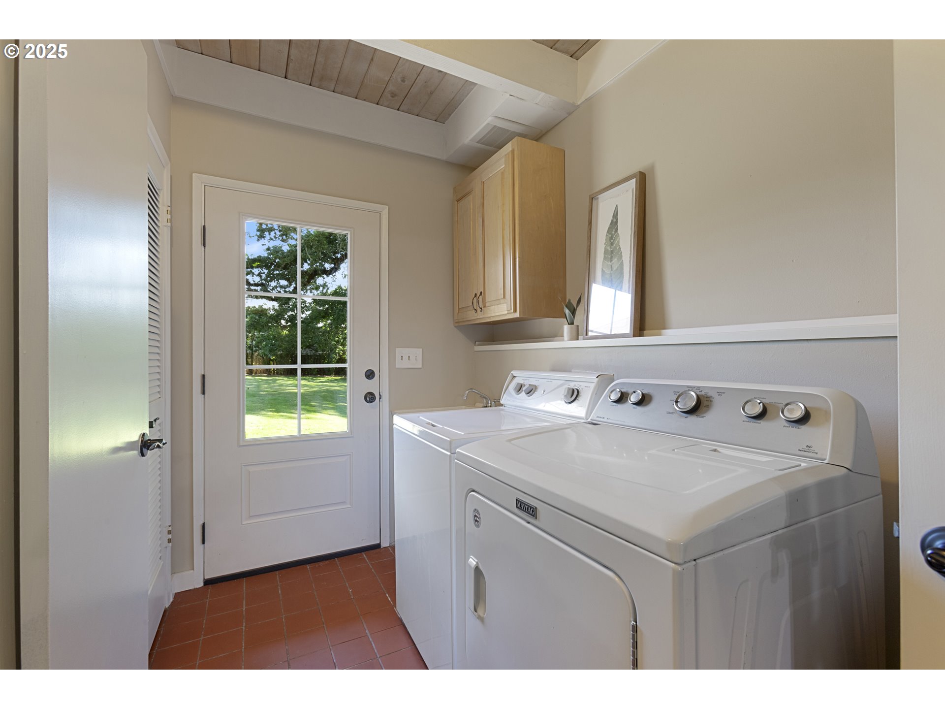 28825 Southwest Grahams Ferry Road Wilsonville, OR 97070 - Photo 12 of 36 a utility room with closet a washer and dryer