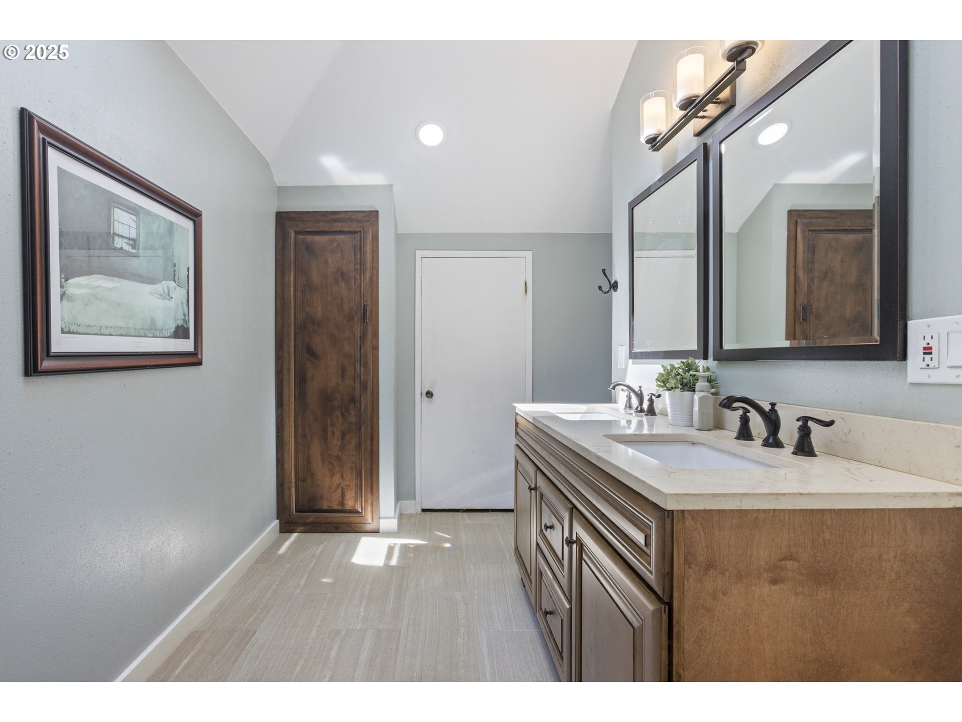 28825 Southwest Grahams Ferry Road Wilsonville, OR 97070 - Photo 22 of 36 a bathroom with a sink and a mirror