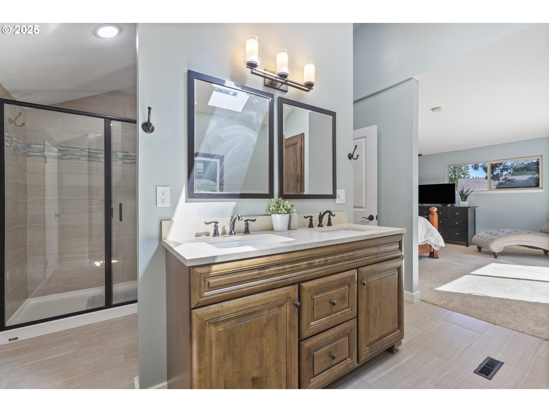 28825 Southwest Grahams Ferry Road Wilsonville, OR 97070 - Photo 23 of 36 a bathroom with a double vanity sink mirror and shower