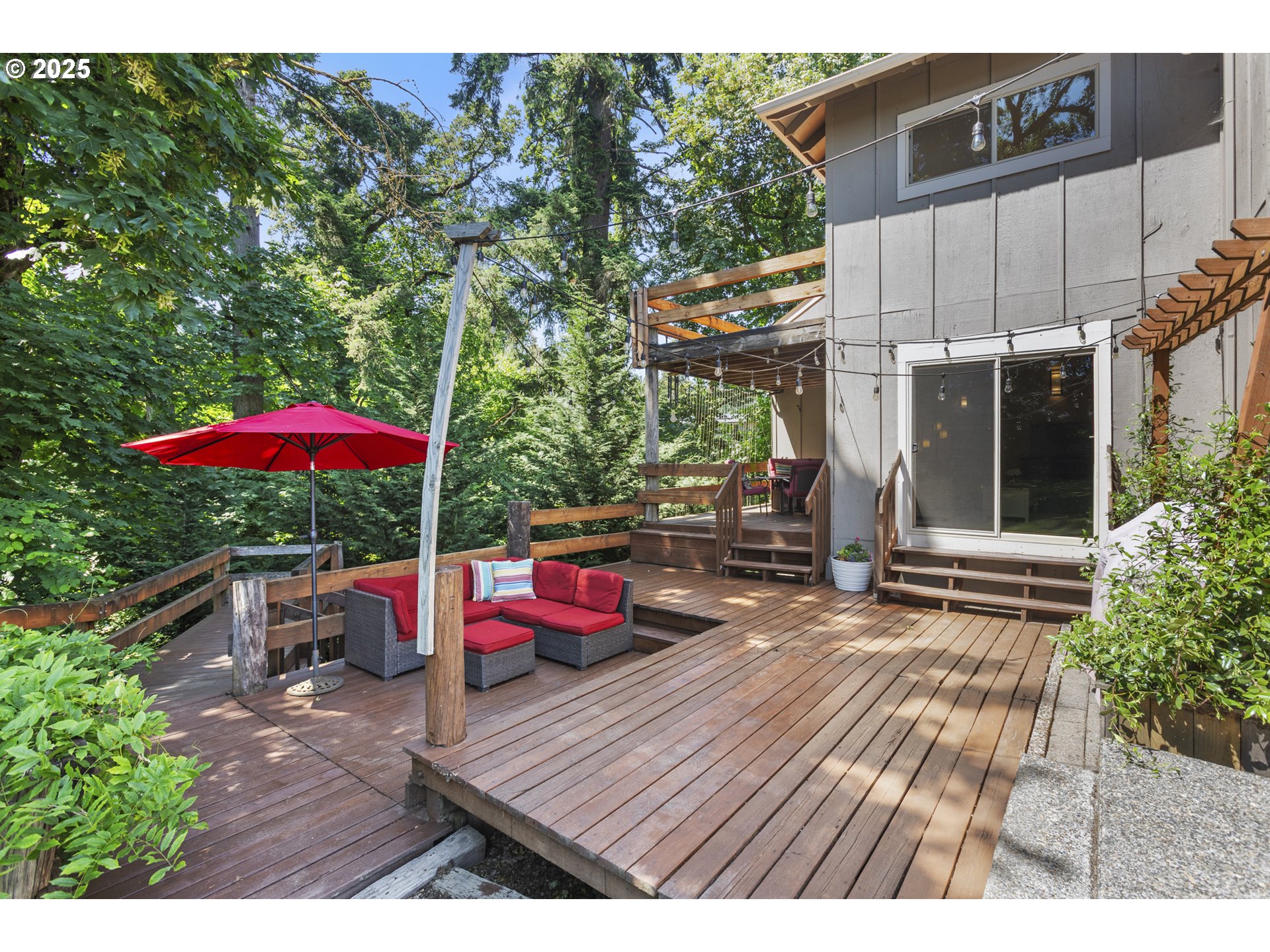 28825 Southwest Grahams Ferry Road Wilsonville, OR 97070 - Photo 25 of 36 a view of a backyard with sitting area and furniture