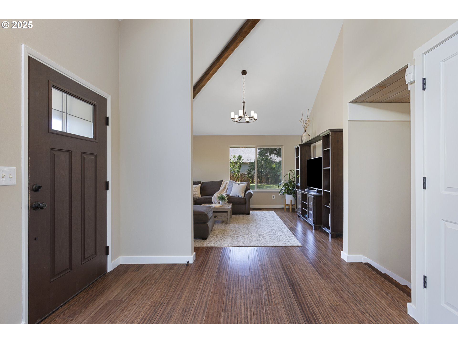 28825 Southwest Grahams Ferry Road Wilsonville, OR 97070 - Photo 4 of 36 a living room with furniture and a wooden floor