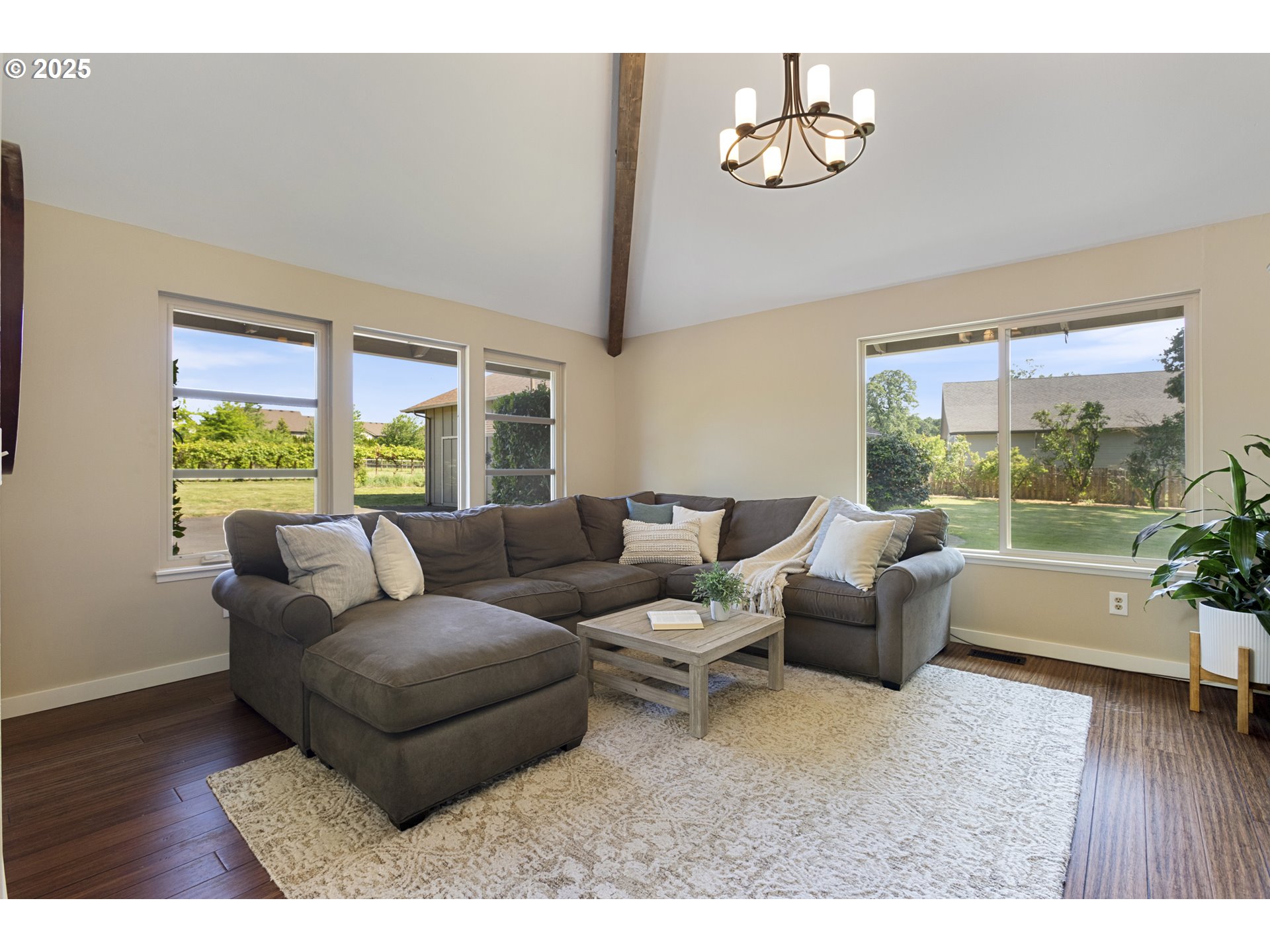28825 Southwest Grahams Ferry Road Wilsonville, OR 97070 - Photo 5 of 36 a living room with furniture and a large window