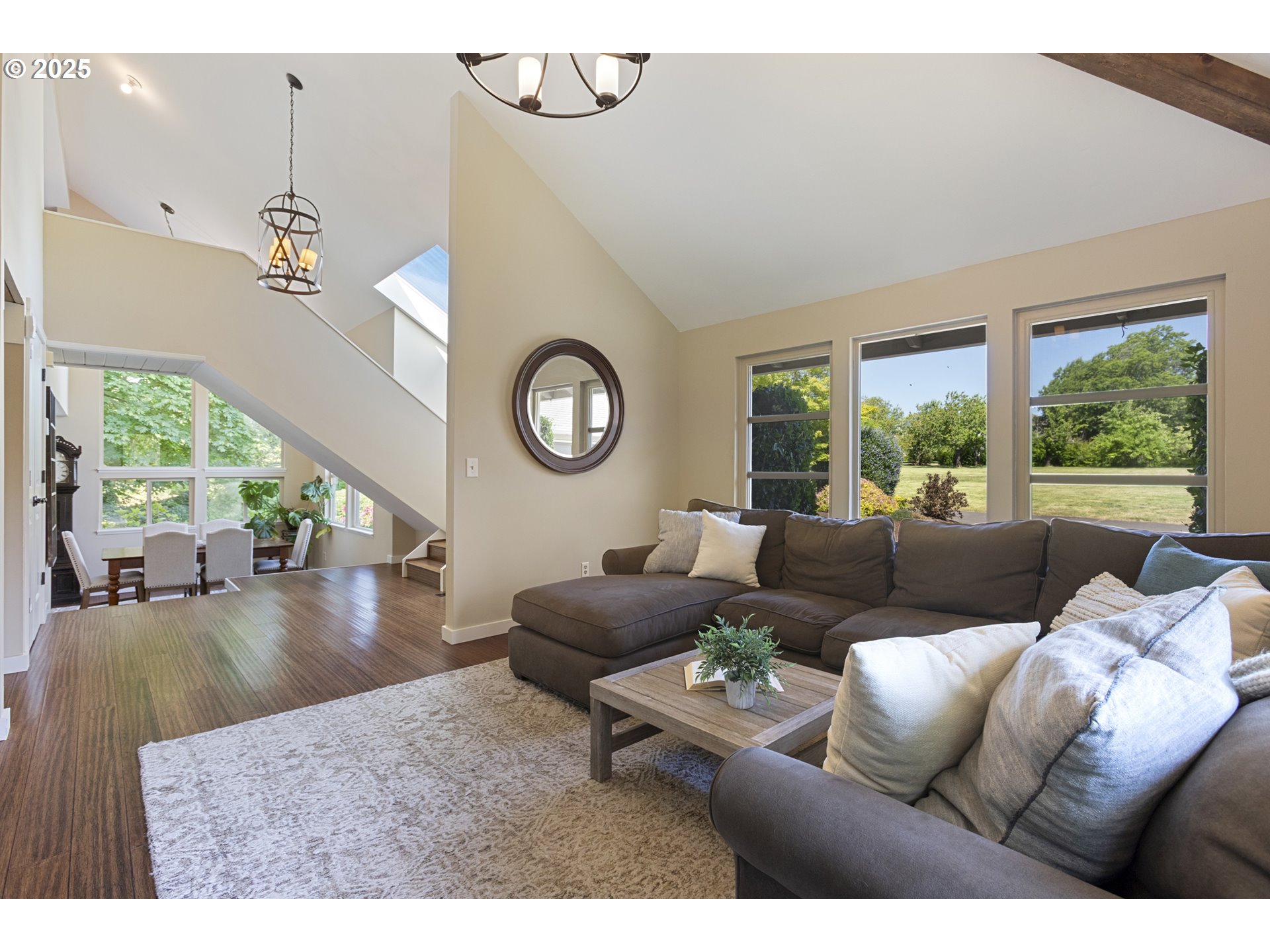 28825 Southwest Grahams Ferry Road Wilsonville, OR 97070 - Photo 6 of 36 a living room with furniture and a large window