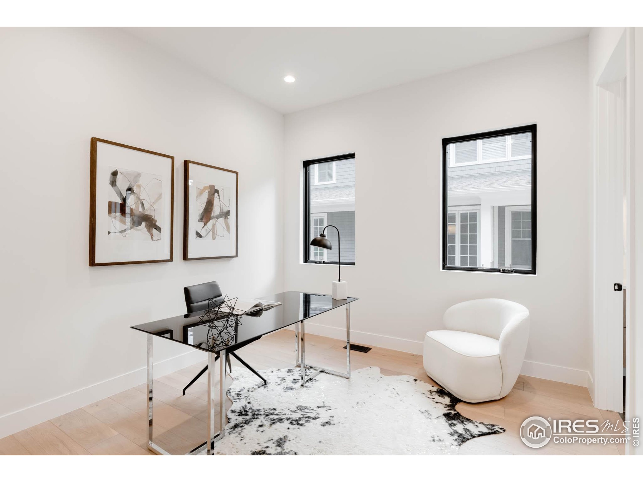 503 Hawthorn Avenue Boulder, CO 80304 - Photo 16 of 27 a living room with furniture and a large window