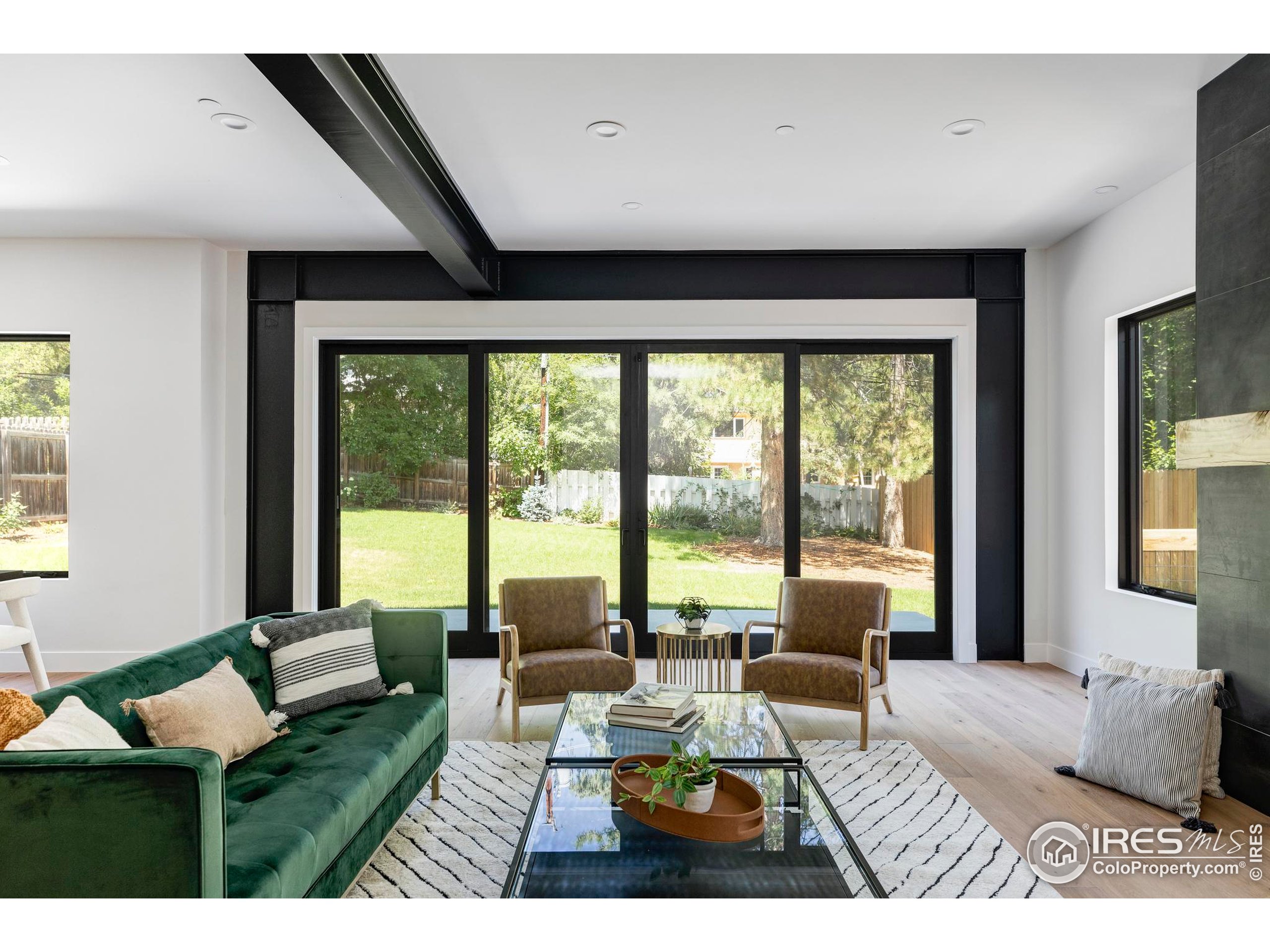 503 Hawthorn Avenue Boulder, CO 80304 - Photo 6 of 27 a living room with furniture and a large window
