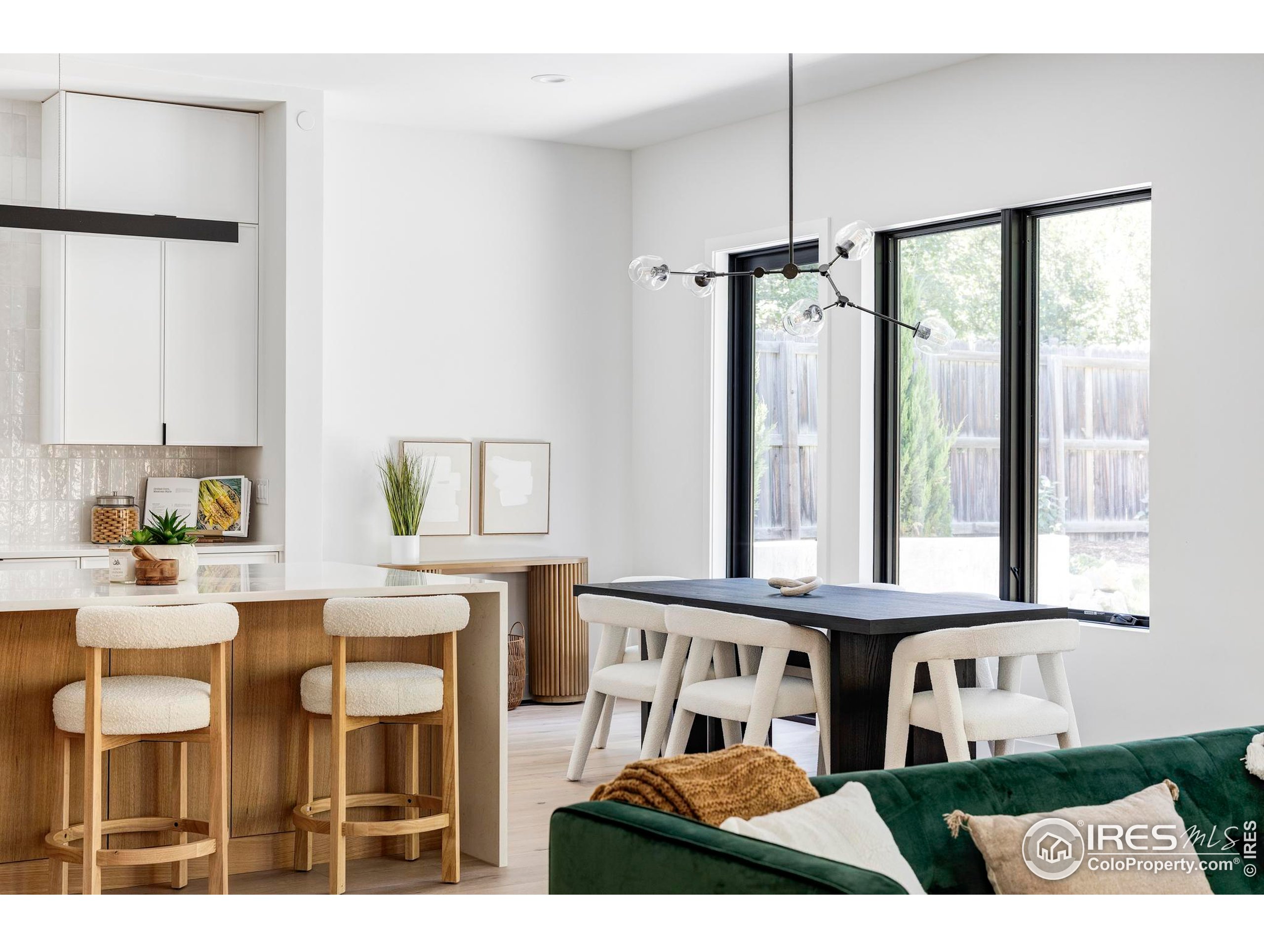 503 Hawthorn Avenue Boulder, CO 80304 - Photo 10 of 27 a living room with furniture a window and appliances