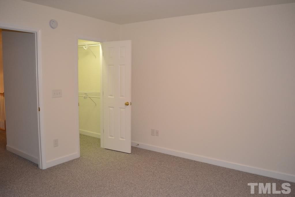 5429 Goldenglow Way Raleigh, NC 27606 - Photo 14 of 21 a view of an empty room