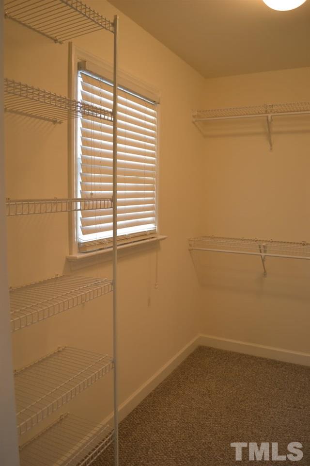 5429 Goldenglow Way Raleigh, NC 27606 - Photo 8 of 21 a bathroom with a window
