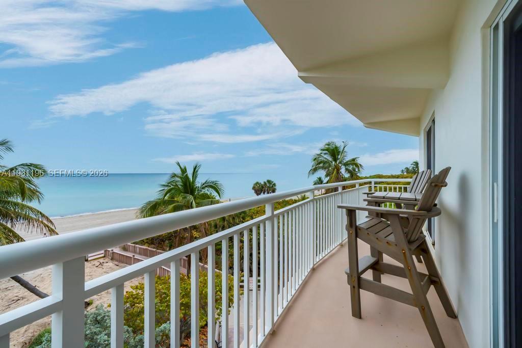 901 South Surf Road, Unit 408 Hollywood, FL 33019 - Photo 12 of 52 a view of a balcony with furniture