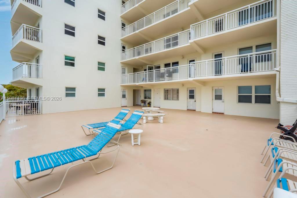 901 South Surf Road, Unit 408 Hollywood, FL 33019 - Photo 31 of 52 a front view of a building with outdoor seating