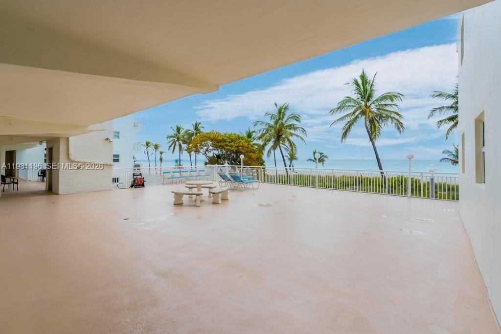 901 South Surf Road, Unit 408 Hollywood, FL 33019 - Photo 32 of 52 a view of a room with window and palm tree