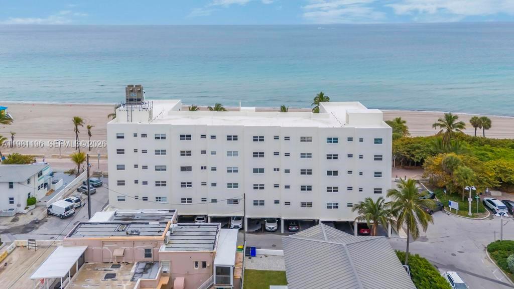 901 South Surf Road, Unit 408 Hollywood, FL 33019 - Photo 35 of 52 a bathroom with a sink and a mirror
