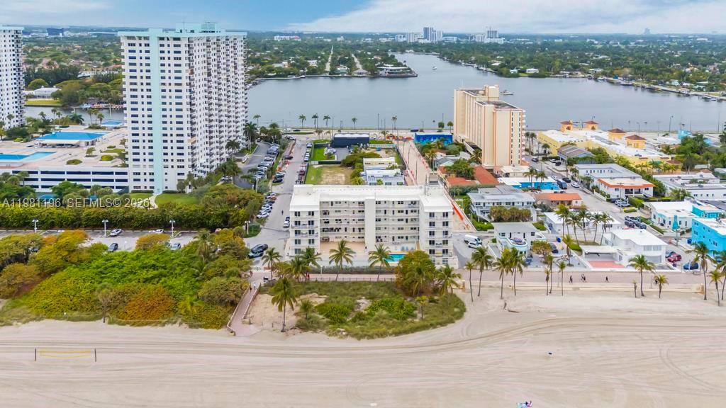 901 South Surf Road, Unit 408 Hollywood, FL 33019 - Photo 42 of 52 an aerial view of a house with a garden and plants