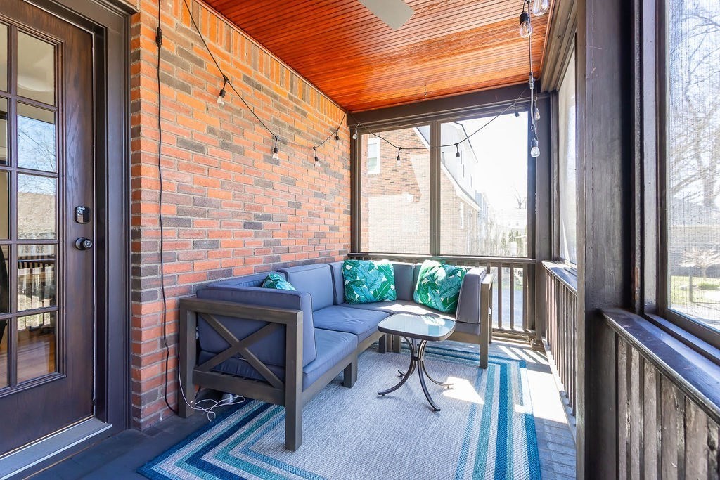 75 Longfellow Road Worcester, MA 01602 - Photo 12 of 37 a porch with a table and chairs