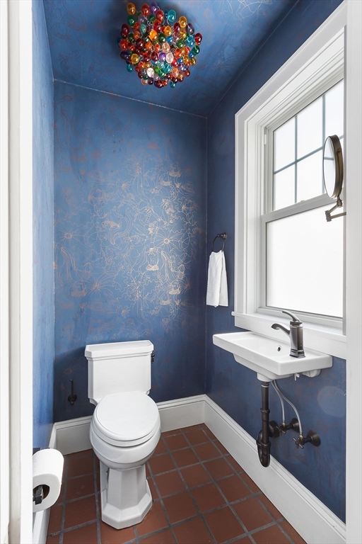 75 Longfellow Road Worcester, MA 01602 - Photo 17 of 37 a bathroom with a toilet a sink and a window