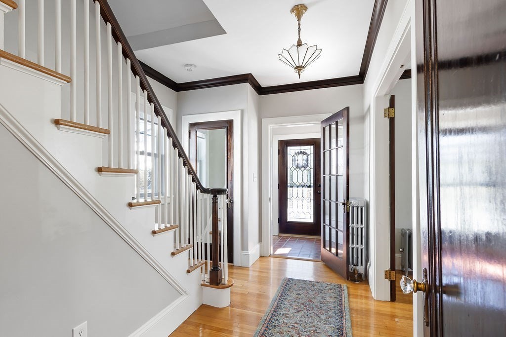 75 Longfellow Road Worcester, MA 01602 - Photo 18 of 37 a view of entryway and hall with wooden floor