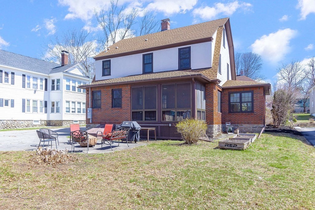 75 Longfellow Road Worcester, MA 01602 - Photo 35 of 37 a front view of a house with outdoor seating