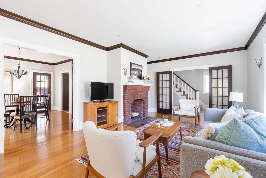 75 Longfellow Road Worcester, MA 01602 - Photo 5 of 37 a living room with fireplace furniture and a flat screen tv