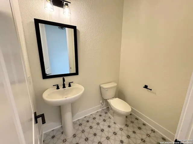 a view of a swimming pool and an umbrella