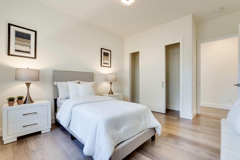 1057 Covington Road Los Altos, CA 94024 - Photo 18 of 31 a bedroom with a bed and a night stand