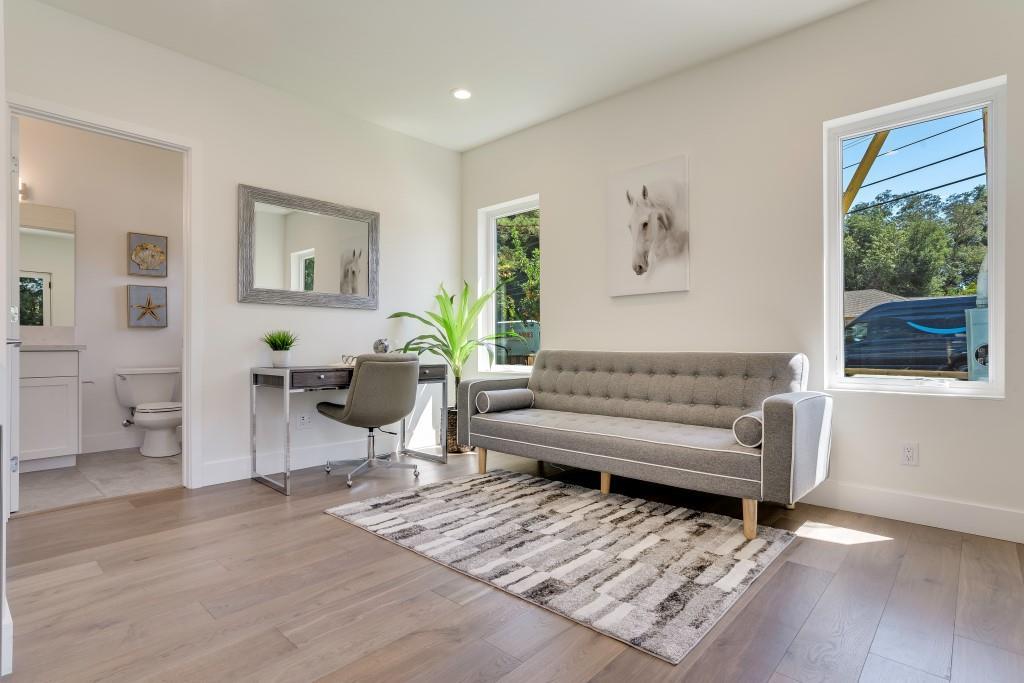 1057 Covington Road Los Altos, CA 94024 - Photo 21 of 31 a living room with furniture and a window