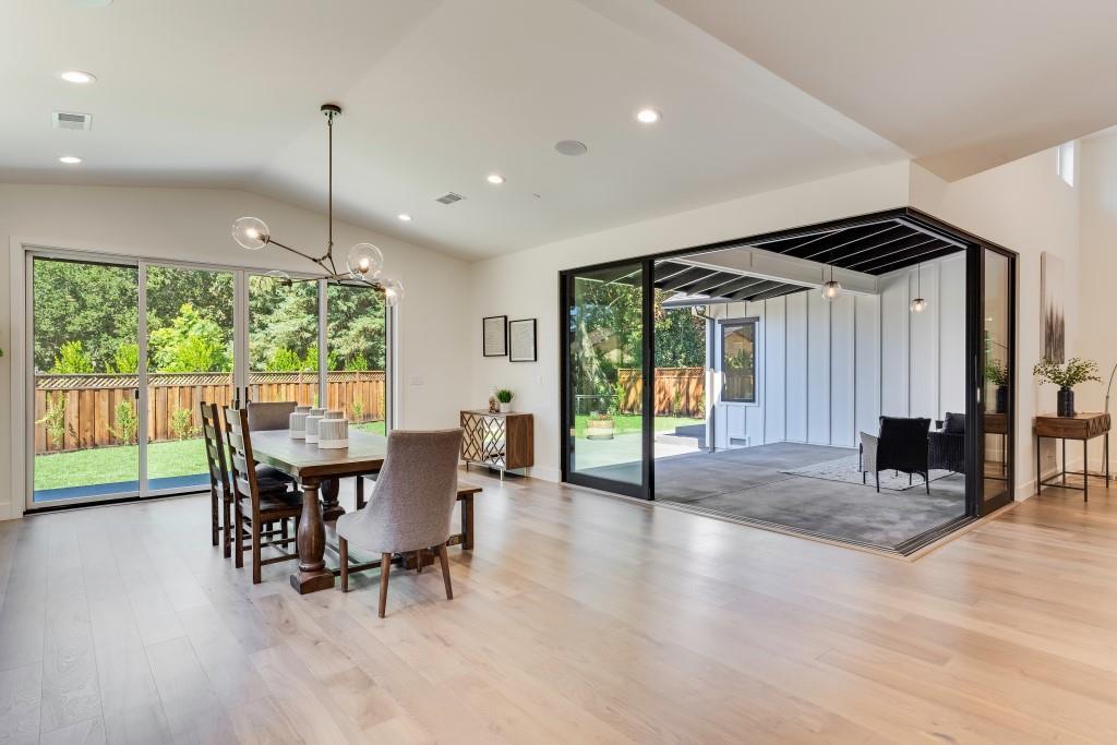 1057 Covington Road Los Altos, CA 94024 - Photo 23 of 31 a view of a dining room with furniture window and wooden floor