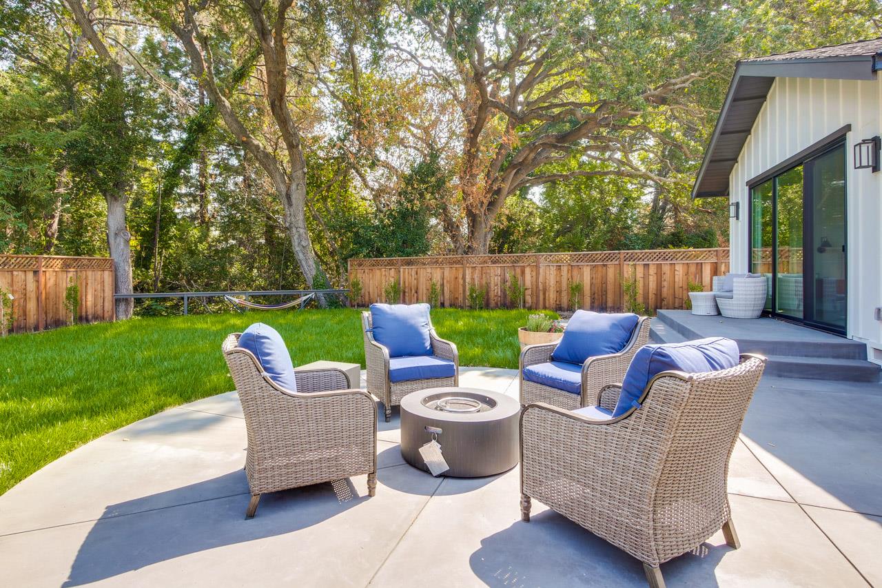 1057 Covington Road Los Altos, CA 94024 - Photo 27 of 31 a patio with patio a couch and wooden fence