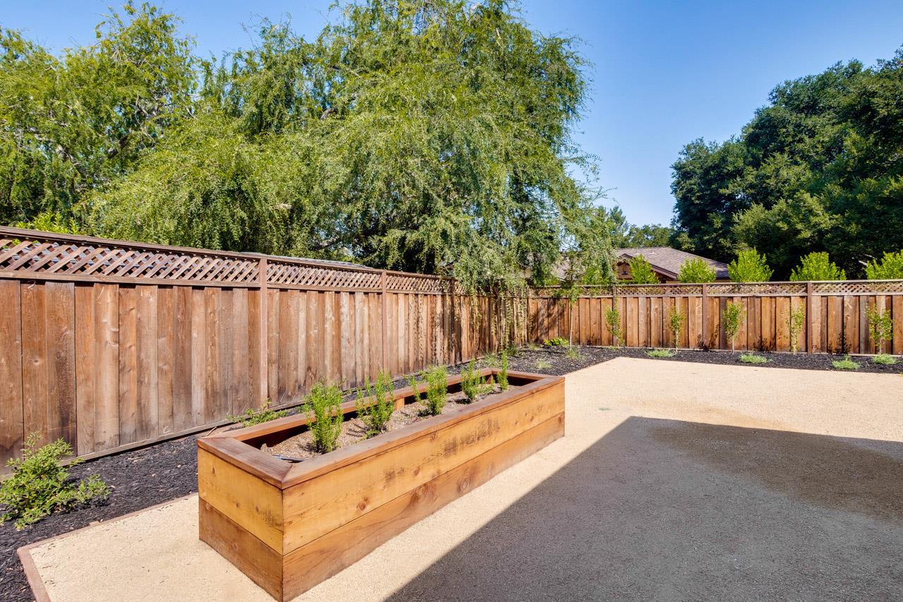 1057 Covington Road Los Altos, CA 94024 - Photo 28 of 31 a view of a back yard with wooden fence