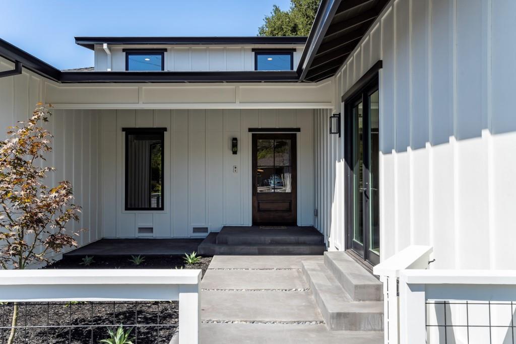 1057 Covington Road Los Altos, CA 94024 - Photo 5 of 31 a front view of a house with a yard