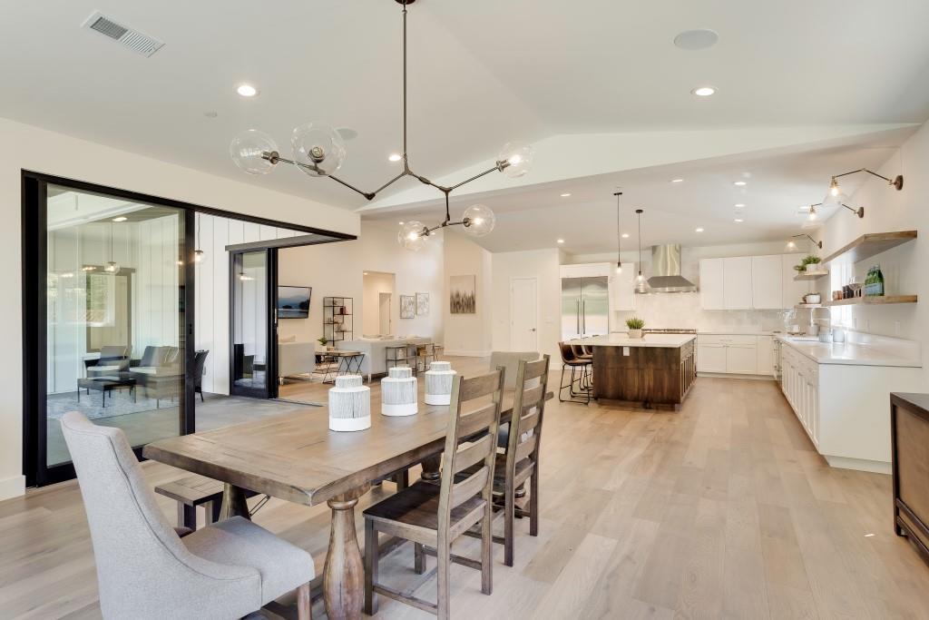 1057 Covington Road Los Altos, CA 94024 - Photo 10 of 31 a large kitchen with a table and chairs