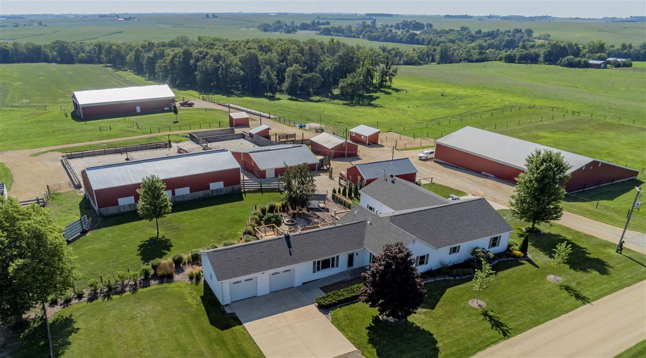 3517 North Marrill Road Byron, IL 61010 - Photo 1 of 36 an aerial view of a house with outdoor space patio and mountain view