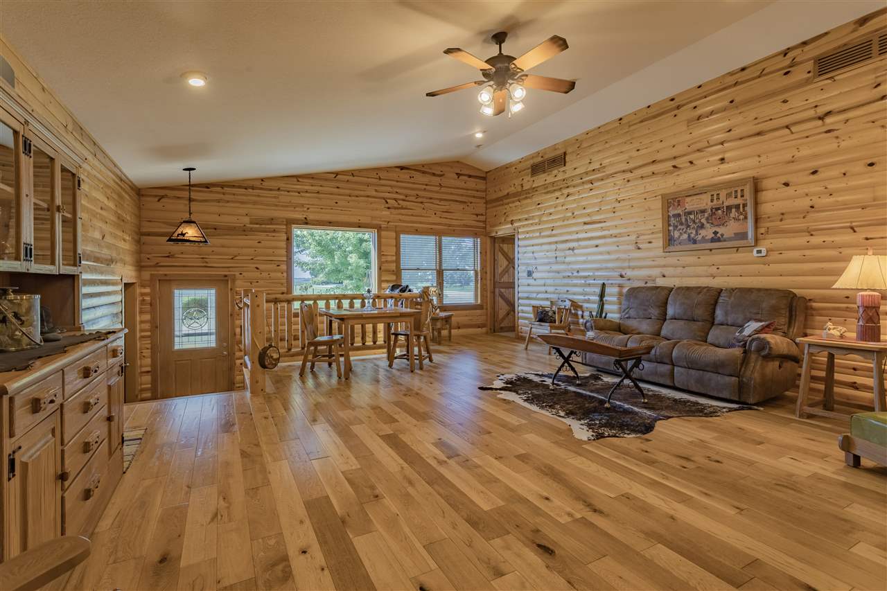 3517 North Marrill Road Byron, IL 61010 - Photo 16 of 36 a living room with furniture and a wooden floor