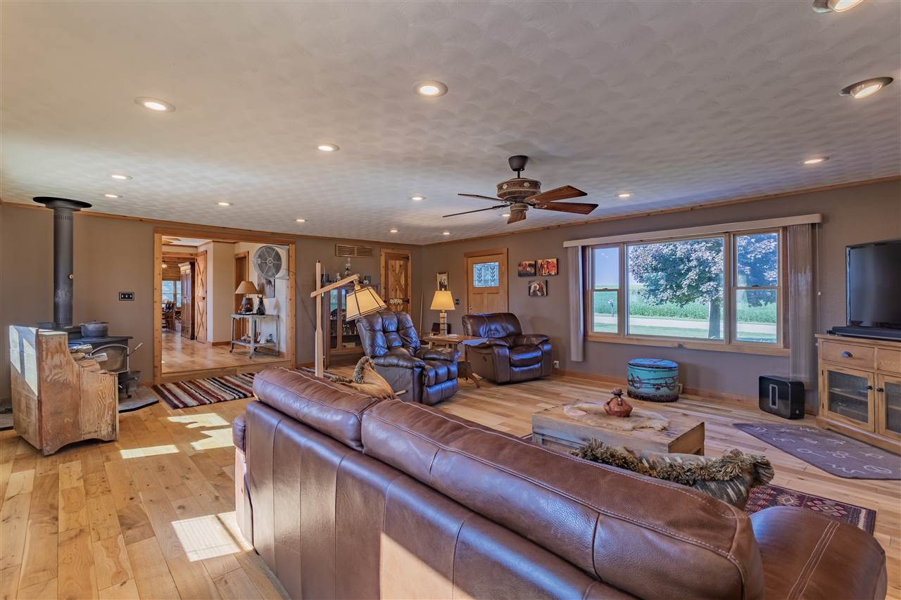 3517 North Marrill Road Byron, IL 61010 - Photo 18 of 36 a living room with furniture and a large window