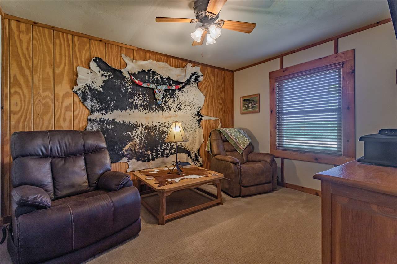 3517 North Marrill Road Byron, IL 61010 - Photo 20 of 36 a living room with furniture and a window
