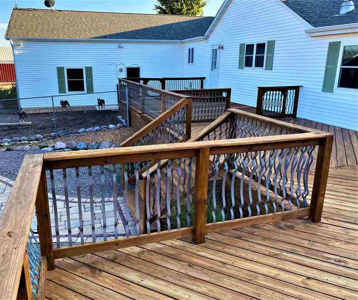 3517 North Marrill Road Byron, IL 61010 - Photo 3 of 36 a view of a wooden deck front of house