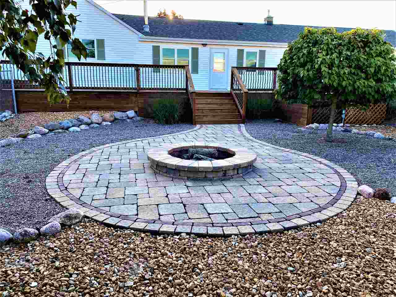 3517 North Marrill Road Byron, IL 61010 - Photo 4 of 36 a view of a backyard with a fountain