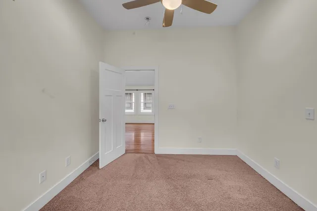 a bathroom with a sink a toilet and a shower